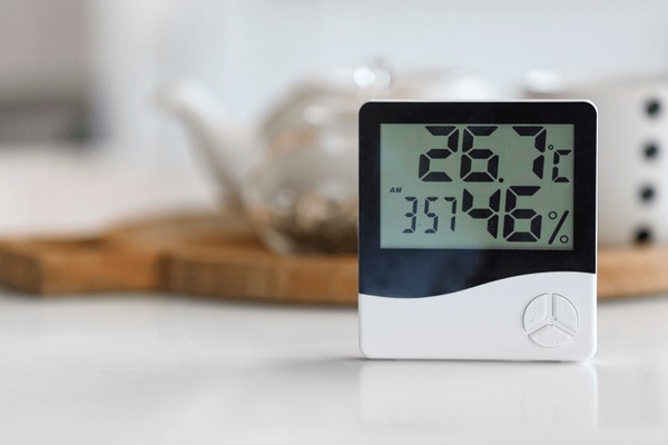 Digital indoor thermometer hygrometer displaying home temperature and humidity